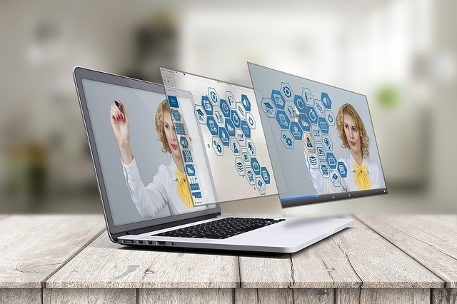 An illustration of AR assets overlayed over a person on a laptop screen